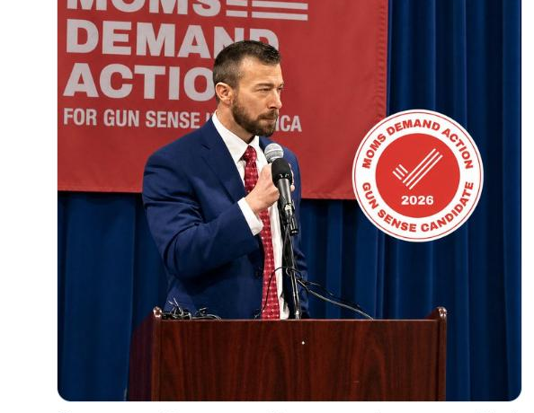 Adam Moore speaking at a Moms Demand Action event
